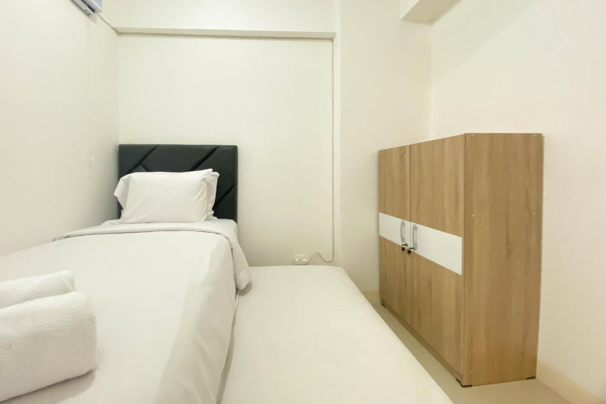 Apartment And Homey 2br Bassura By Travelio